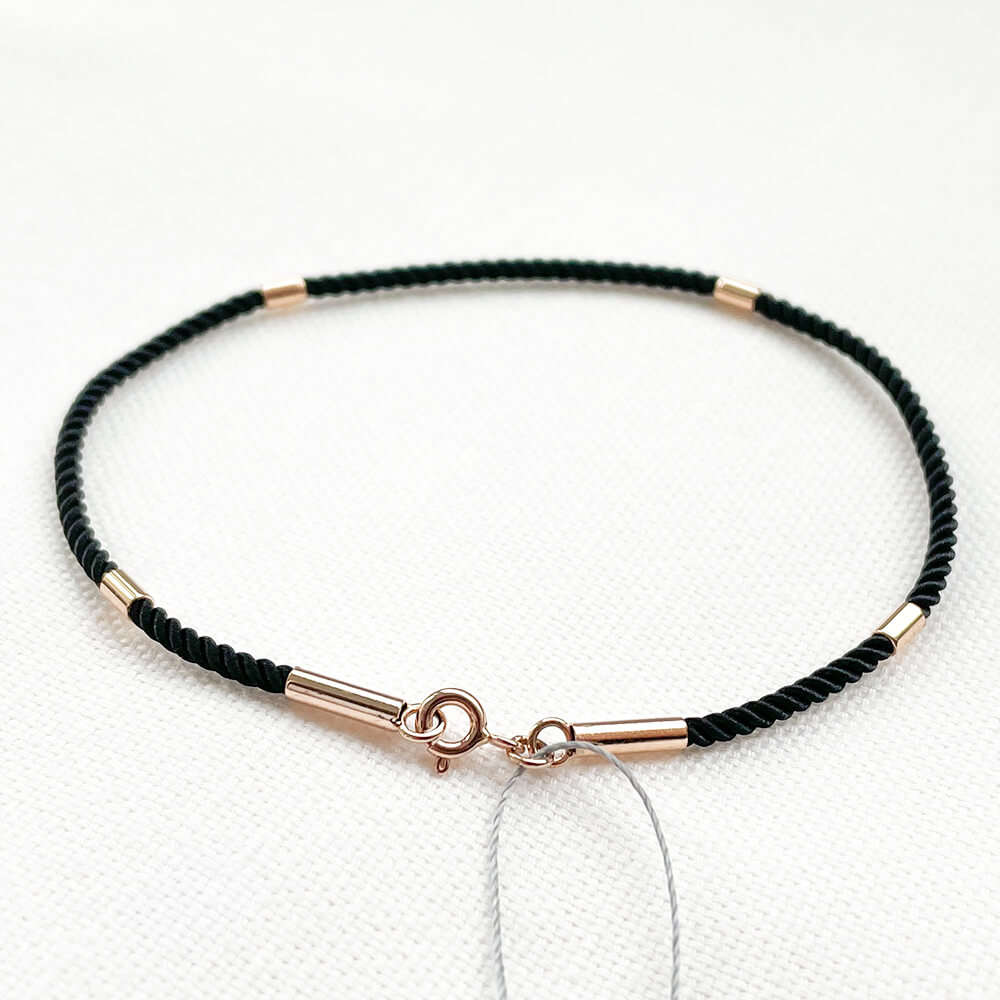 Шовковий браслет із 4 золотими вставками. Артикул: 004169