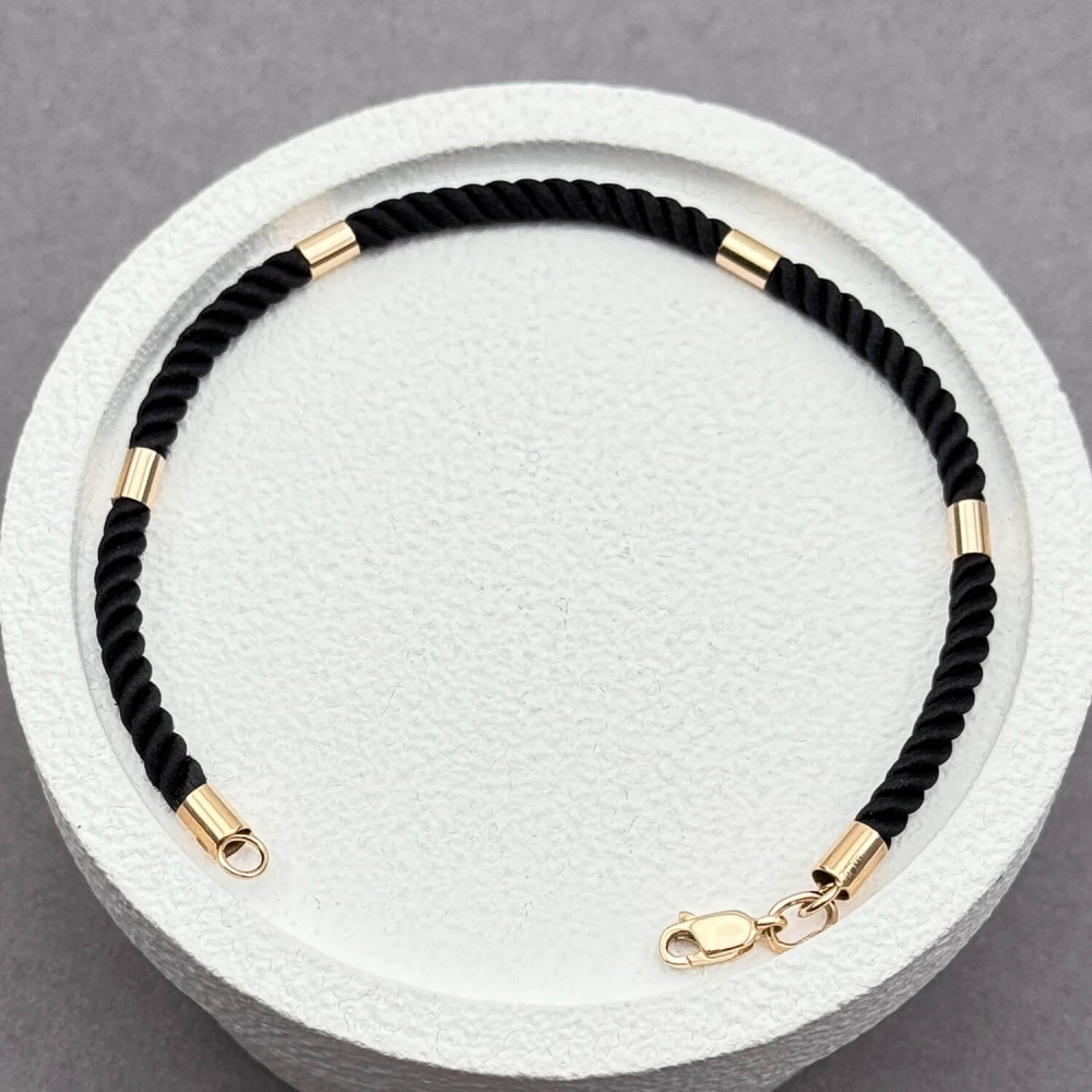 Шовковий браслет із 4 золотими вставками. Артикул: 008366