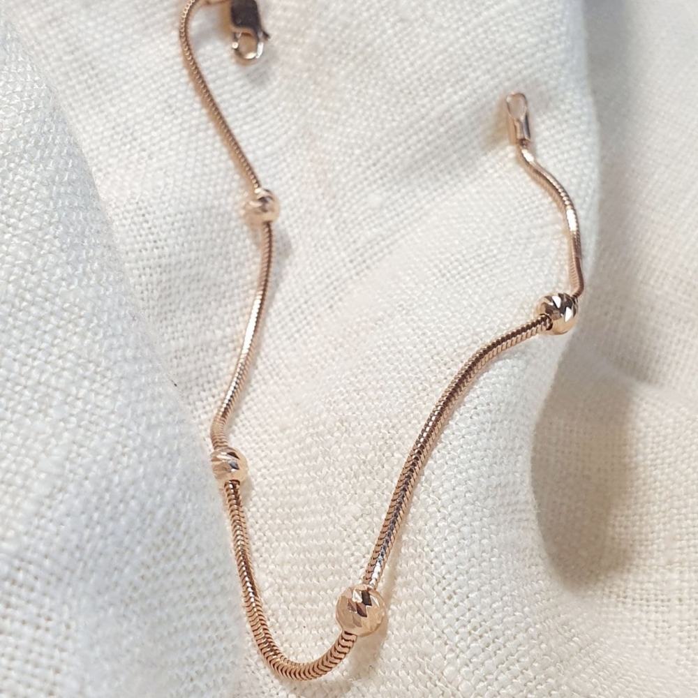 Золотий браслет з алмазними кульками