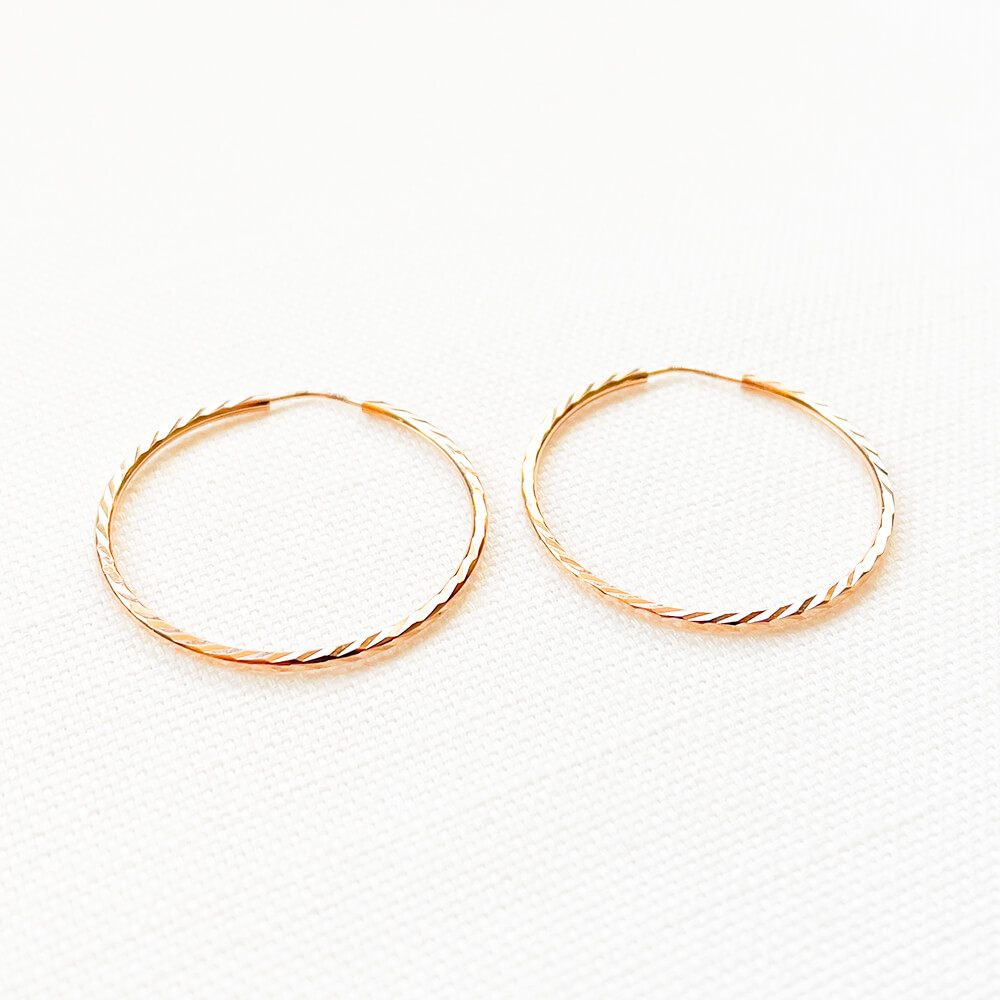 Золотые серьги-кольца 3см с алмазной гранью. Артикул: 005781