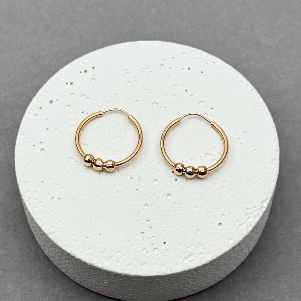 Золотые серьги-кольца с алмазными шариками. Артикул: 009012