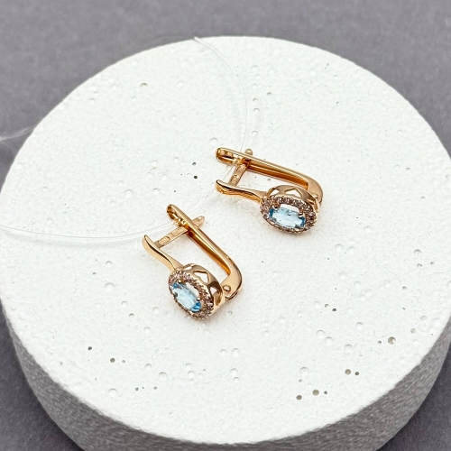 Золотые серьги с топазом и фианитами. Артикул: 009829
