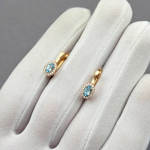 Золотые серьги с топазом и фианитами. Артикул: 009829