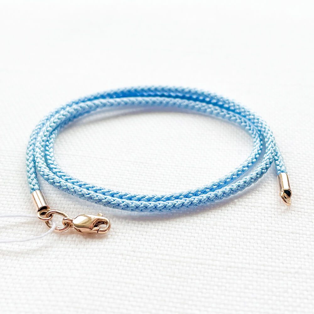 Голубой шелковый ювелирный шнурок 2мм с золотым замком. Артикул 004734